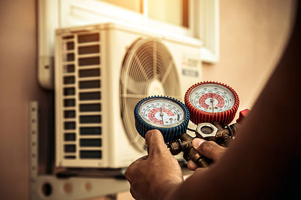 Professional Air Conditioning Service technician working in Bethlehem, KY